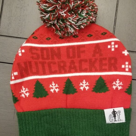 Buddy the Elf Son of a Nutcracker Red & Green Pom Pom Beanie Hat - Picture 6 of 6
